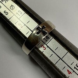 Sterling Silver toe ring with a cross design. Size 2.75